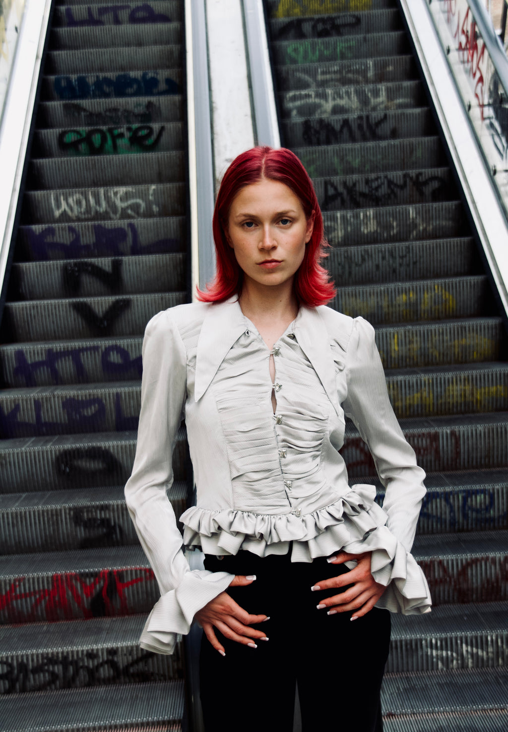 Ruffled Victorian inspired blouse with tooth silver buttons