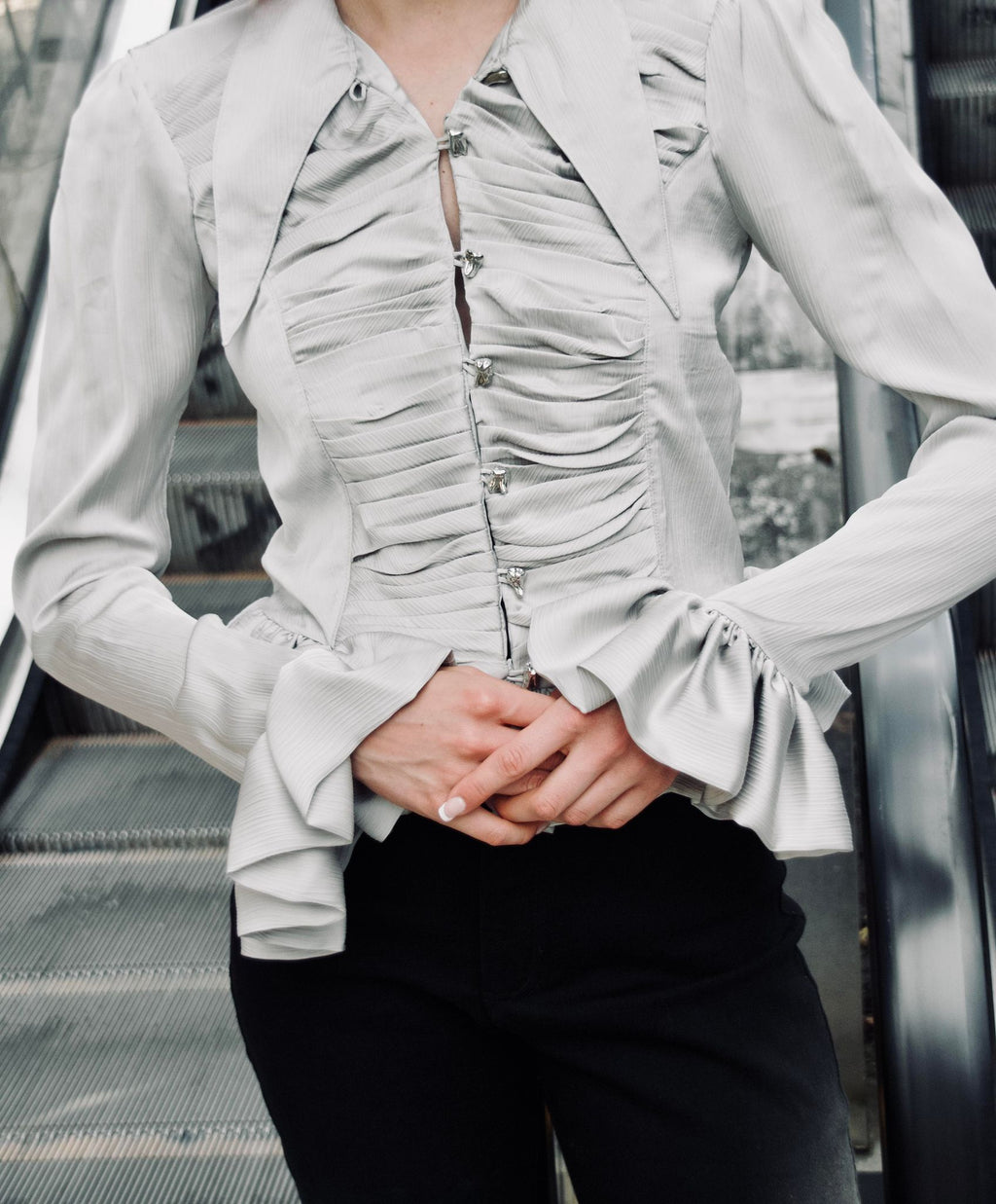 Ruffled Victorian inspired blouse with tooth silver buttons